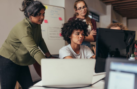 Women looking at a computer